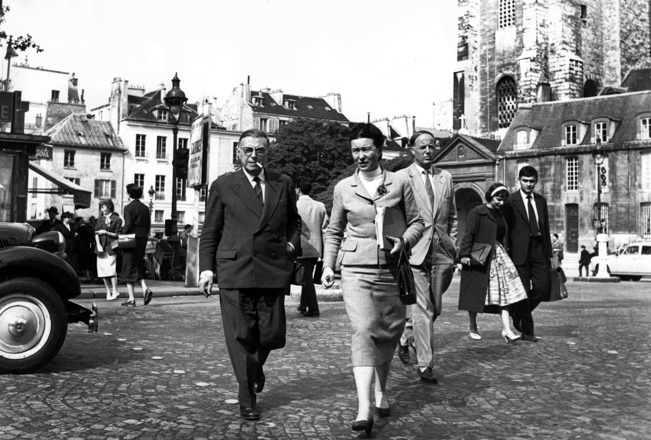 Simone de Beauvoir and Jean-Paul Sartre crossing Place Saint-Germain-des-Prés, Paris, mid 1950s. Photo: René Saint Paul.